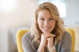 Smiling mature woman after Labiaplasty in NYC